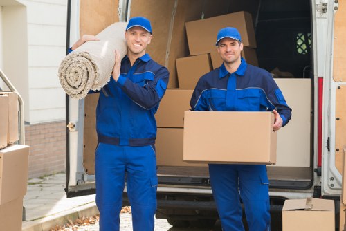 Man with a van loading furniture in Kingstonuponthames