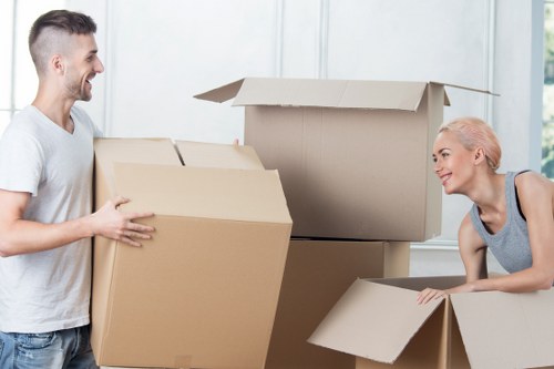 Loading household items into a moving truck in Kingston upon Thames